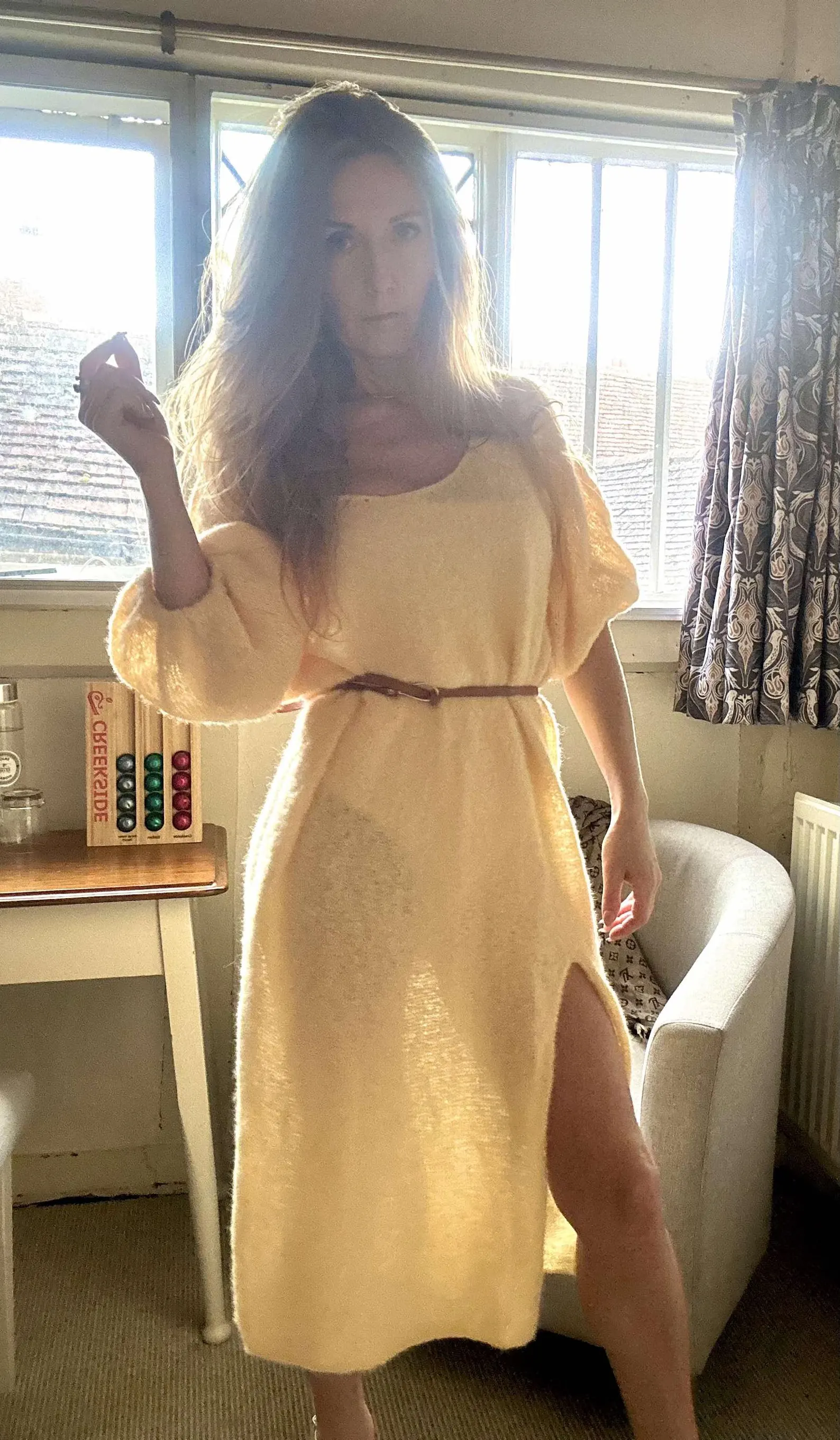 Hand-knitted alpaca midi dress with an off-the-shoulder neckline and a side slit; fits sizes XS–M.